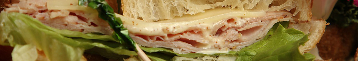 Eating Sandwich Cheesesteak at I B's Hoagies restaurant in Oakland, CA.